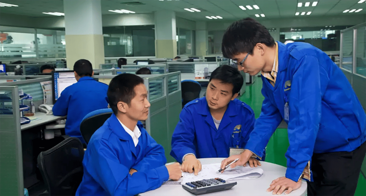 group of engineers planning around a table