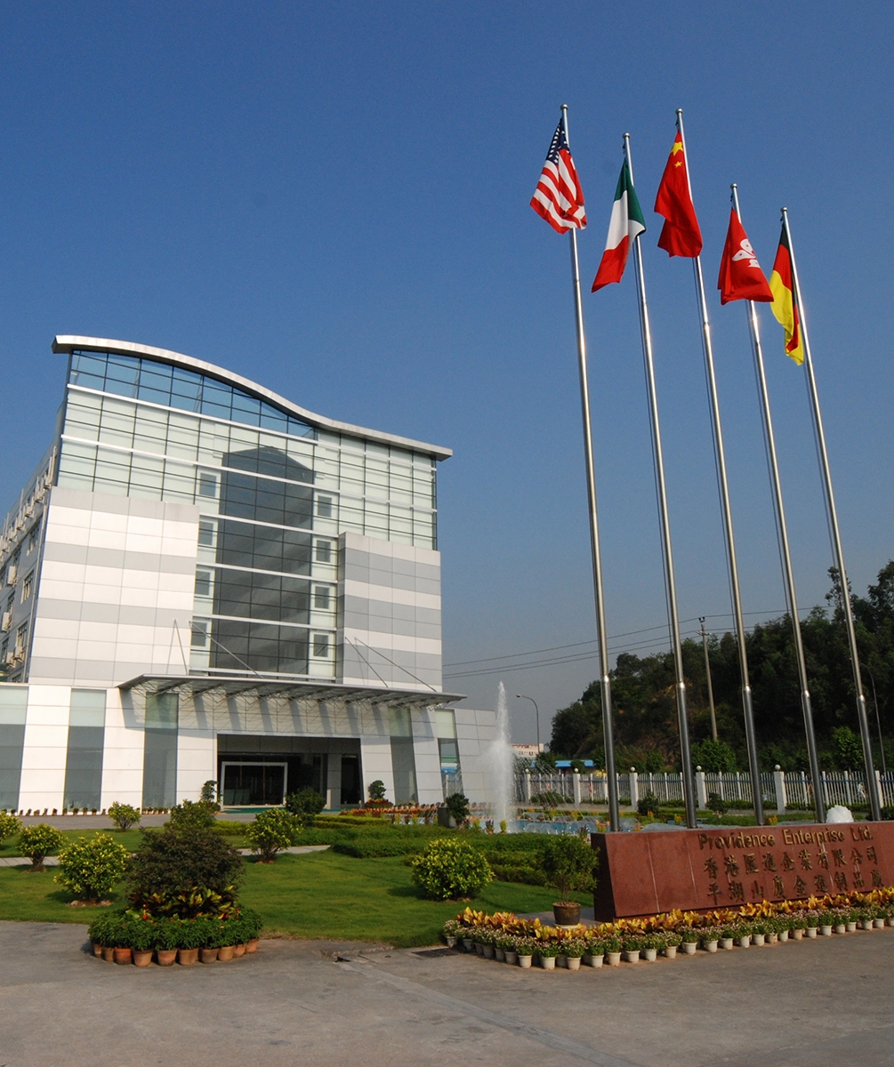 Providence Enterprise hq with sign and international flags in front